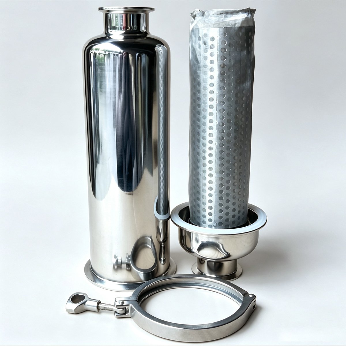Haoqintech 304 stainless steel sanitary tri-clamp filter housing standing upright next to perforated mesh filter element seated in base with silicone gasket and tri-clamp in foreground