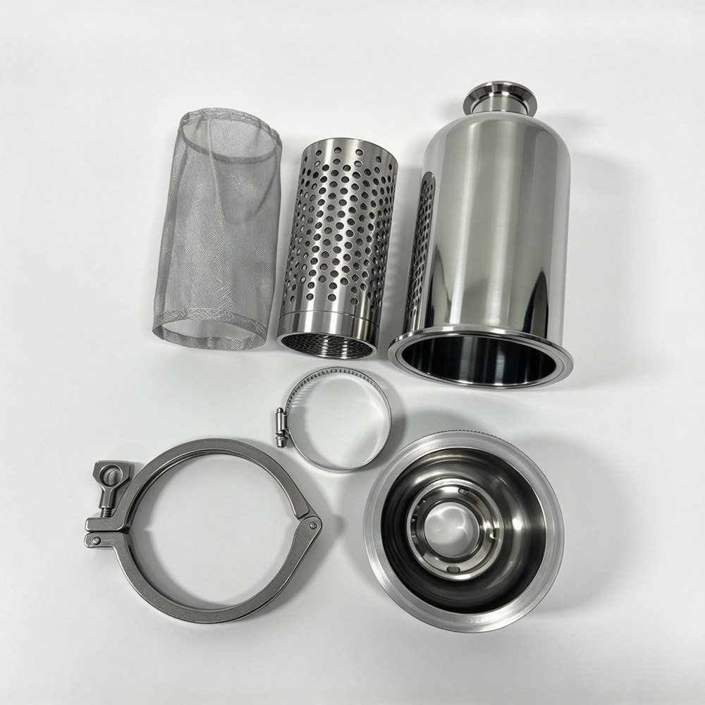 Disassembled sanitary stainless steel 304 tri-clamp inline filter showing mesh screen, perforated support tube, housing, clamps and gasket