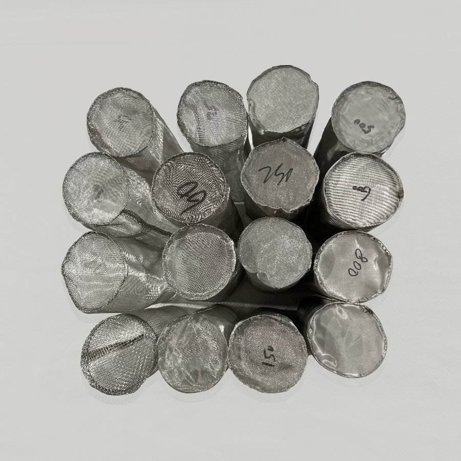 Top view of multiple 304 stainless steel woven mesh filter cylinders in various mesh sizes including 40, 60, 80, 100, 120, 150, 200, 250, 300, 400 and 500 mesh for sanitary Y-strainers and inline filters