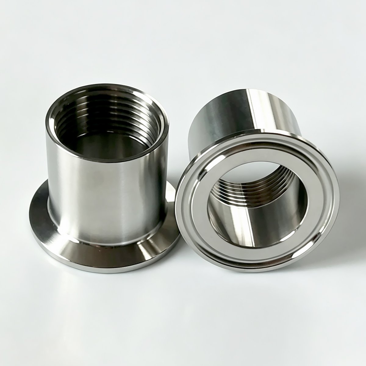 304 SS tri-clamp female threaded adapter showing internal thread and clamp face