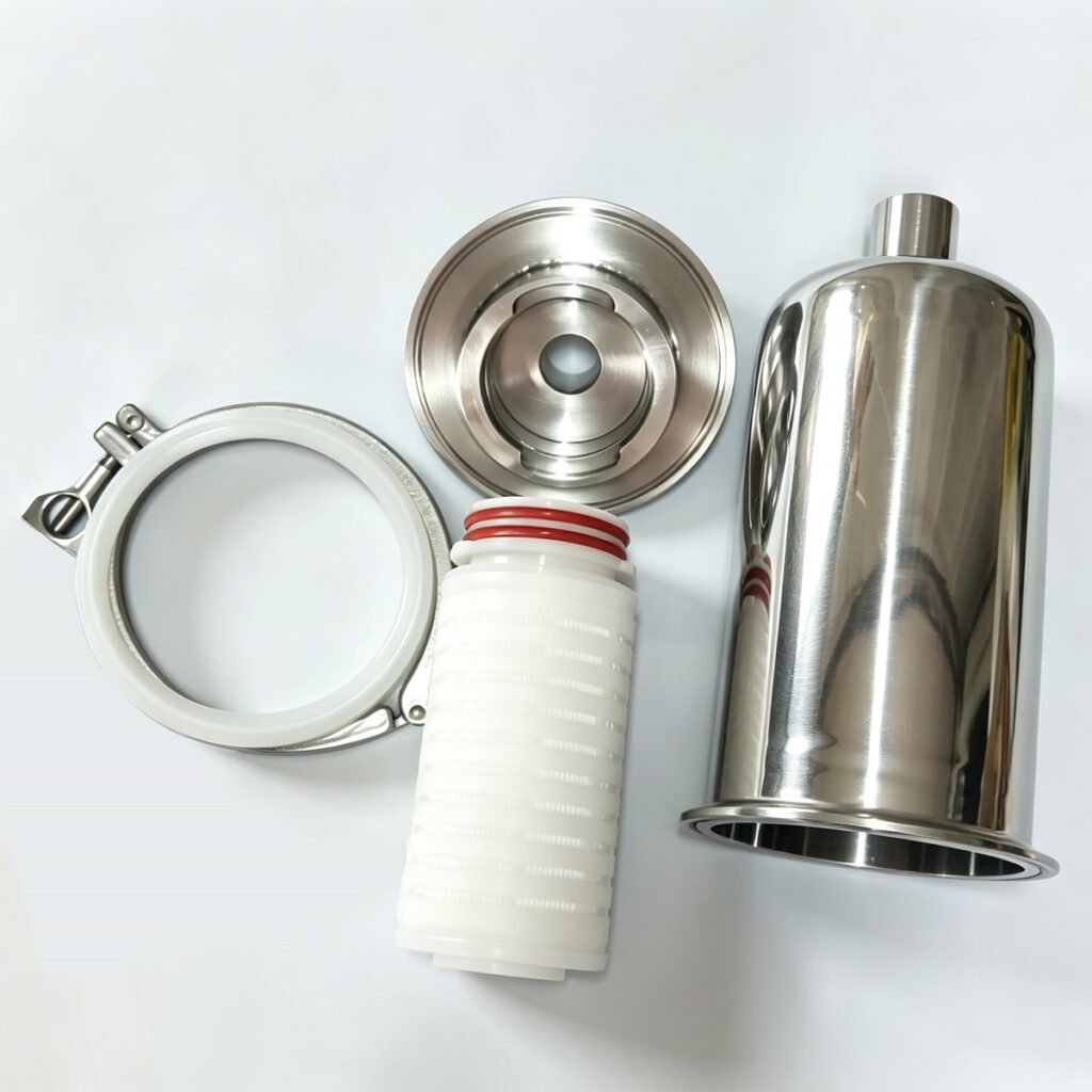 Exploded view of sanitary stainless steel breather filter showing PP cartridge with red O-rings, end cap, housing and clamp