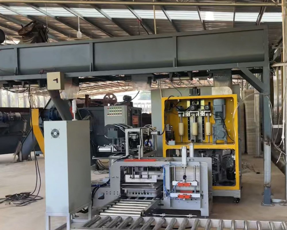 Industrial automatic bagging machine with yellow frame, conveyors and hydraulic presses for mushroom cultivation bags
