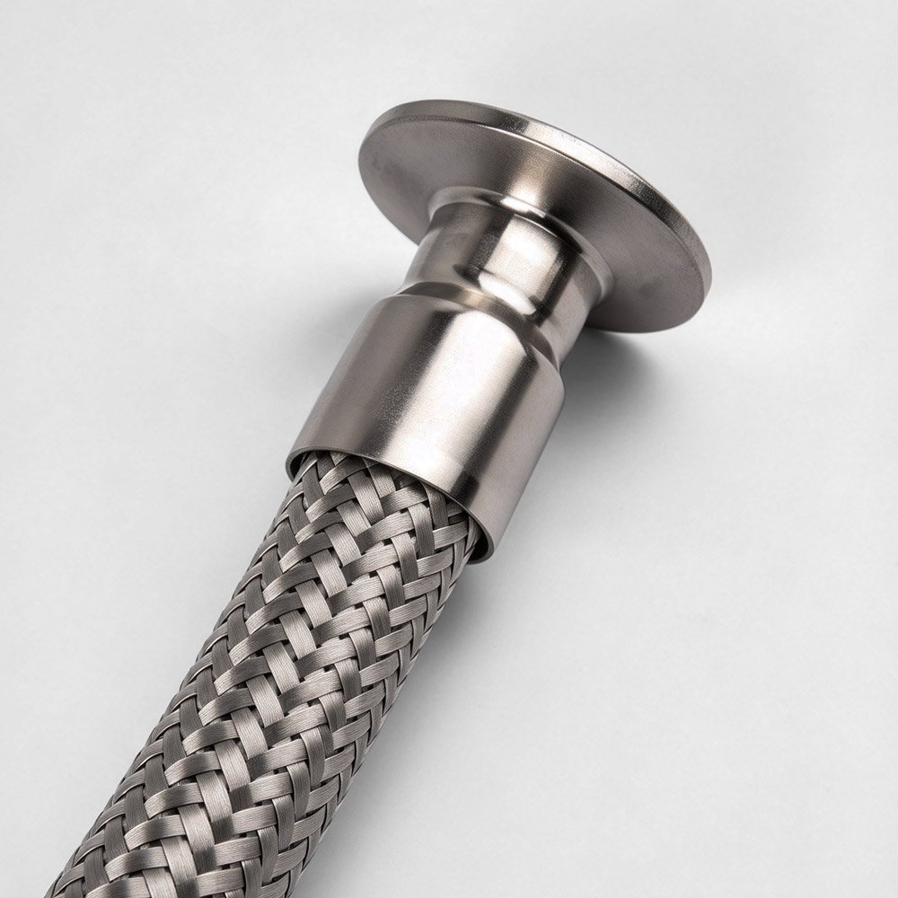 Close-up of sanitary Tri-Clamp ferrule on 304 stainless steel braided flexible hose